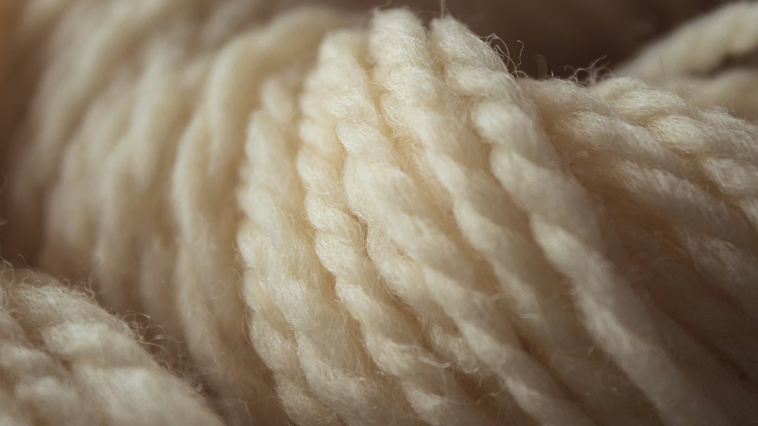 Cream wool fibre, illustrating the Australian wool used in selected mattress layers.